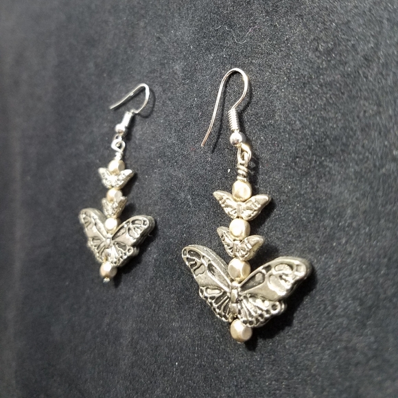 Whimsical Silver-Toned Butterfly Charm Dangling Handcrafted Earrings - Picture 4 of 6